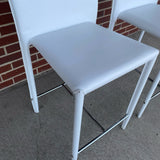 Pair of Counter Height White Faux leather Stools