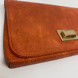 Shiraleah Orange Pebbled Faux Leather Clutch