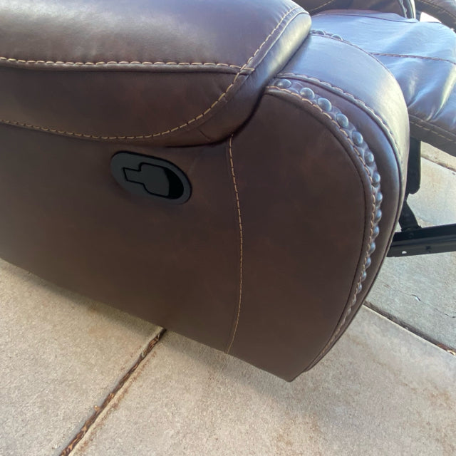 Rocking Brown Faux leather Recliner