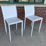 Pair of Counter Height White Faux leather Stools