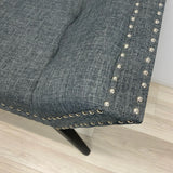 Gray bench silver nailhead trim and black solid wood legs