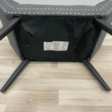 Gray bench silver nailhead trim and black solid wood legs