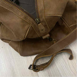 Root Beige Distressed Duffle Bag