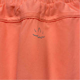 Beyond Yoga Size L-12 Women's Peach Solid Pull On Skort