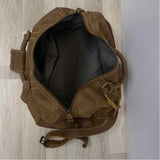 Root Beige Distressed Duffle Bag