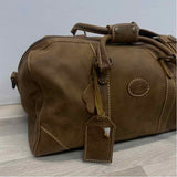 Root Beige Distressed Duffle Bag