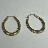 Yellow 14K Huggie Earrings