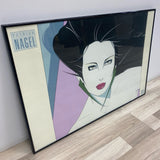 Framed Print of Woman with Long Green Earrings by Patrick Nagel