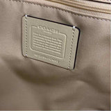 Coach Beige Leather Embossed Trademark Tote Handbag