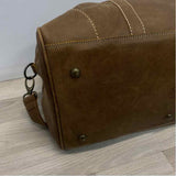 Root Beige Distressed Duffle Bag