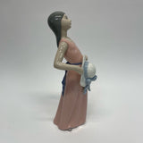 Lladro Figurine he dreamer Girl in Pink Dress Holding a hat