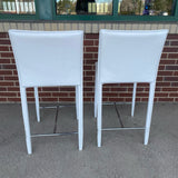 Pair of Counter Height White Faux leather Stools
