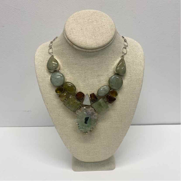 Multistone with center Amethyst Stalacite Flower slice pendant