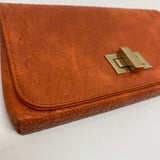 Shiraleah Orange Pebbled Faux Leather Clutch